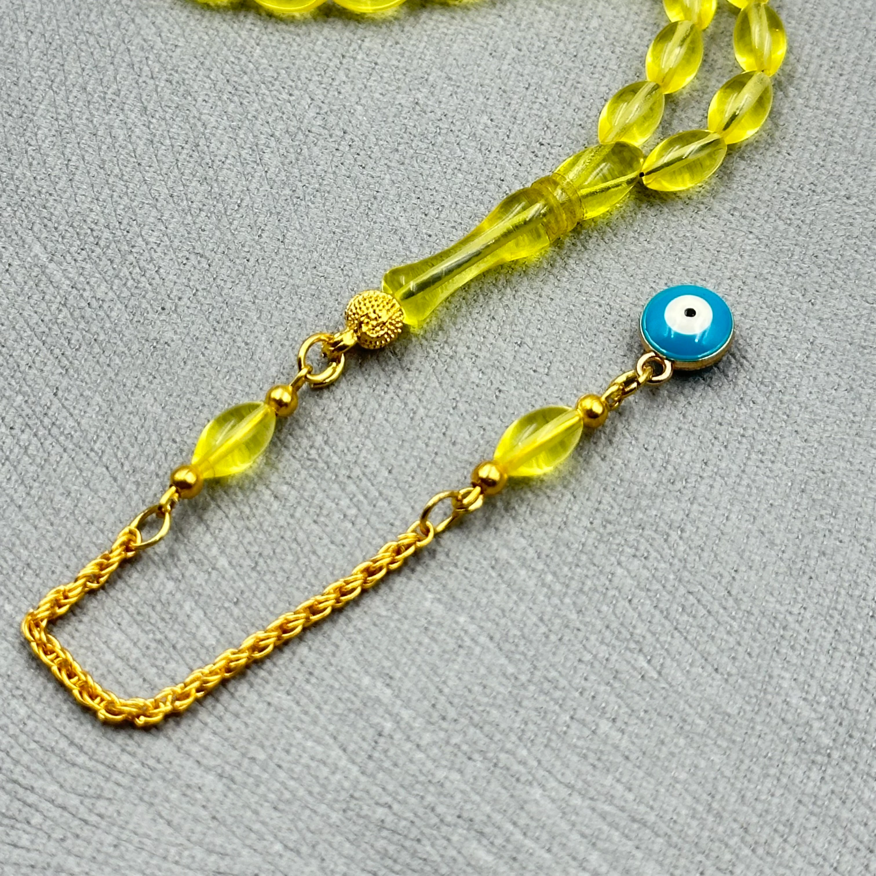 Pirinç Püsküllü Nazar Boncuğu Detaylı Bilek Boy Sarı Uçak Camı Tespih